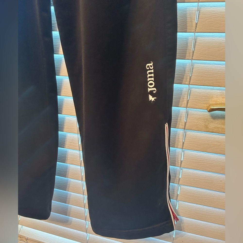 size large men’s Joma red/black/white sweats